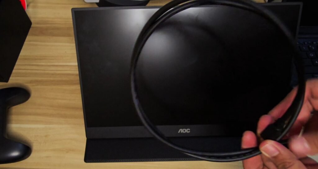 AOC 16T20 only bundles the smart cover and Type C USB cable